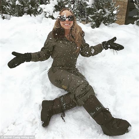 mariah carey dior snow boots|Mariah Carey rocks Dior snow boots while sledding.